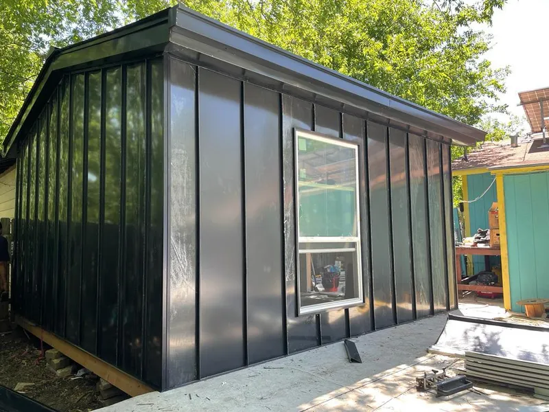 Black standing seam metal wall panels for Metal Roof Installation in Gillette