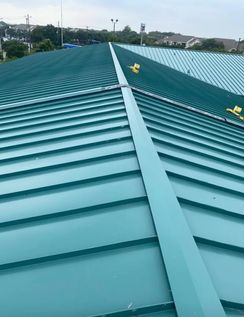 Green commercial metal roof ridge and valley for Metal Roof Repair in Gillette